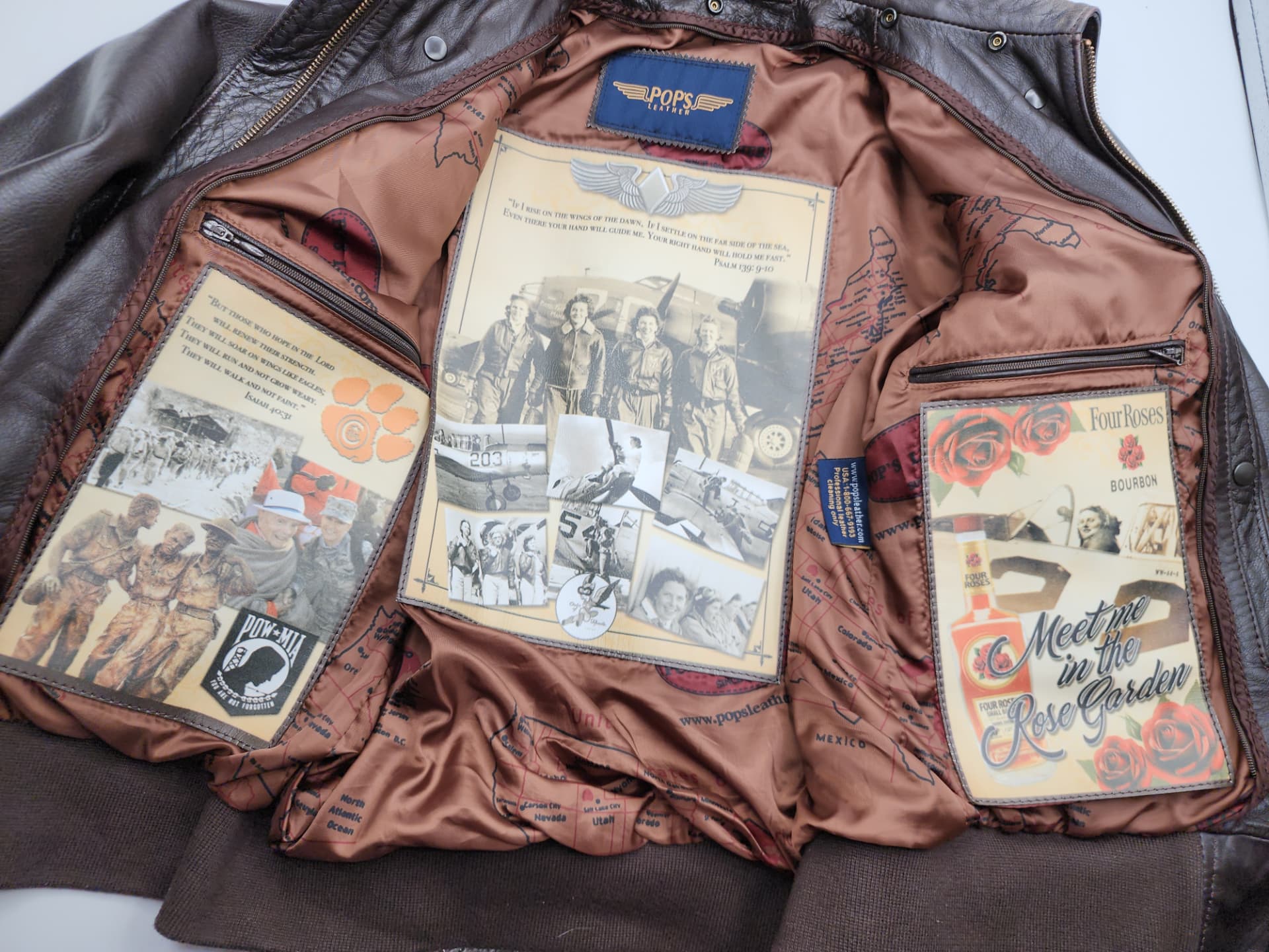 The open lining of Nikki's leather flight jacket, printed with WASP photographs and scripture.