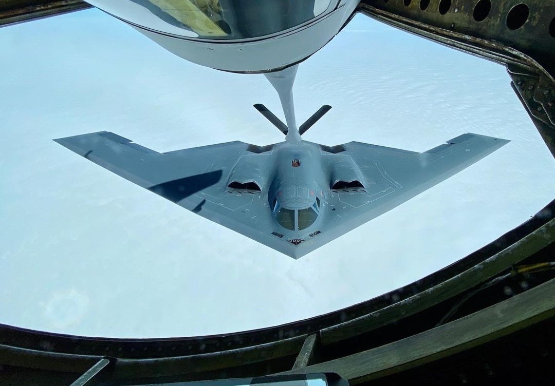 A B-2 taking fuel, seen through the boom operator's window.