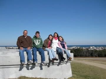 Nikki with family on the wall above the Outer Banks near Kitty Hawk.