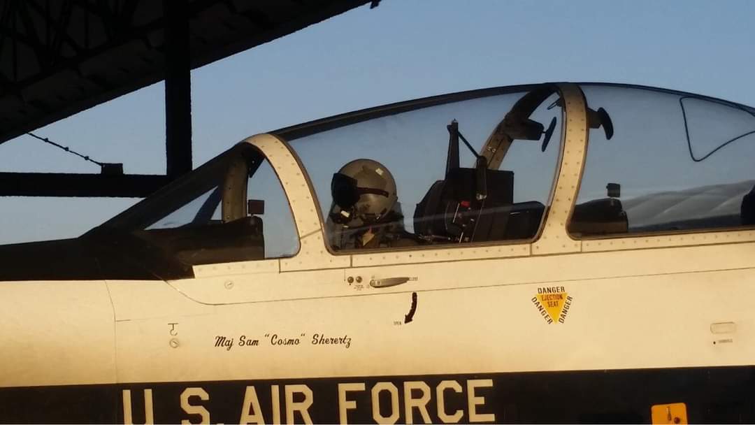 Nikki in her flight helmet under the T-6 canopy.
