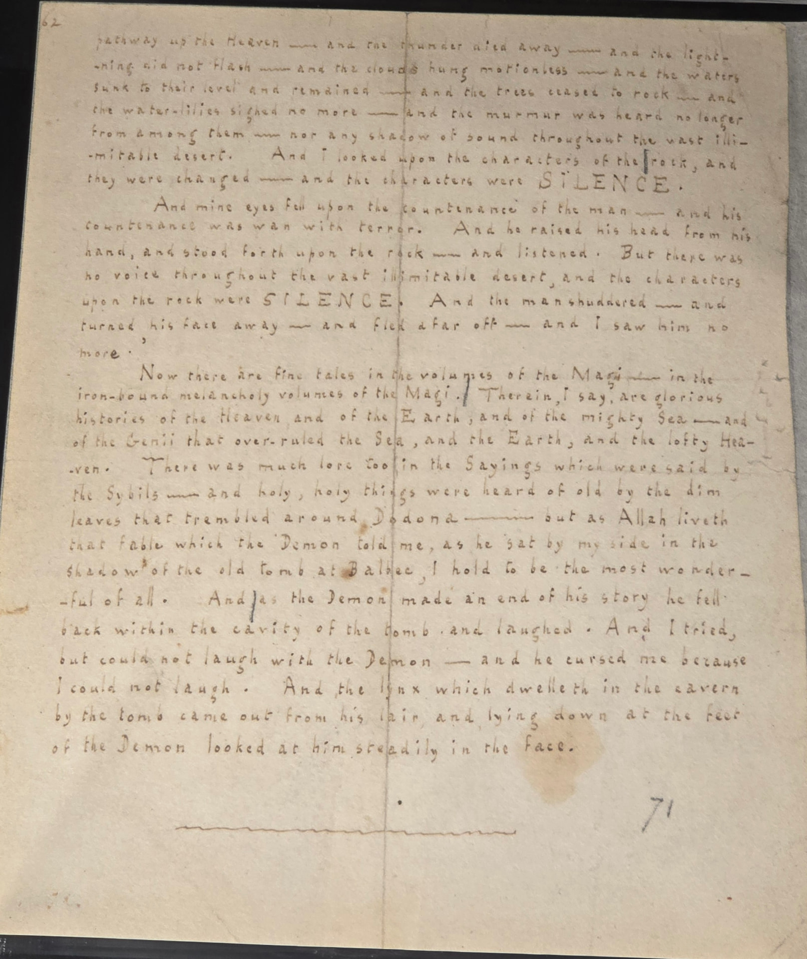 A page of Edgar Allan Poe's handwritten manuscript for an early version of Silence: A Fable, the tiny even print hand broken by long dashes, behind glass at the Poe Museum in Richmond.